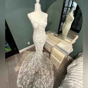 Long formal dress , bridal or formal, long white lace. Never worn .